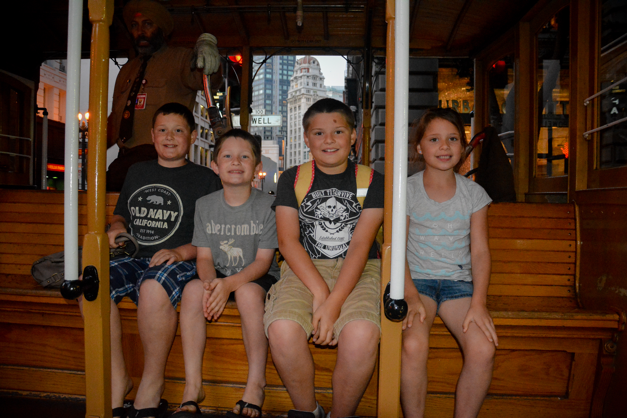 Smiling Kids on cable car in San Francisco