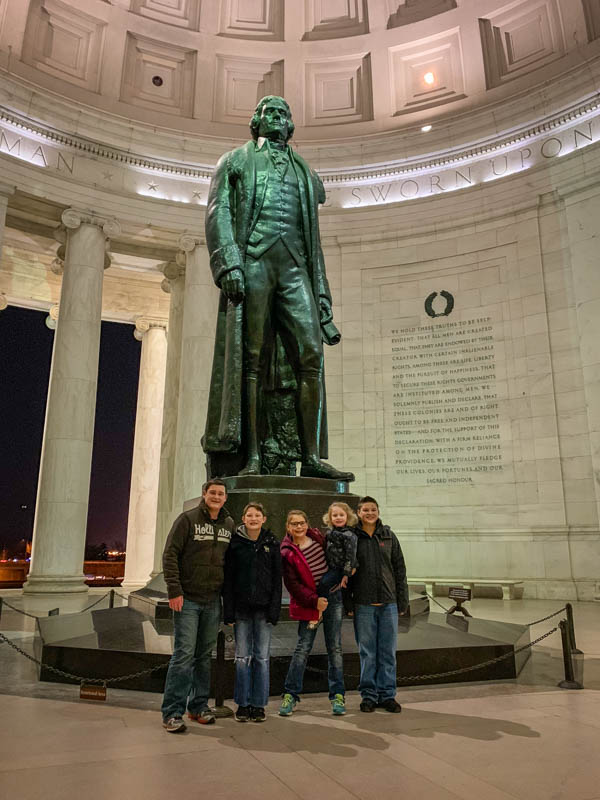 kids at Jefferson Memorial at night