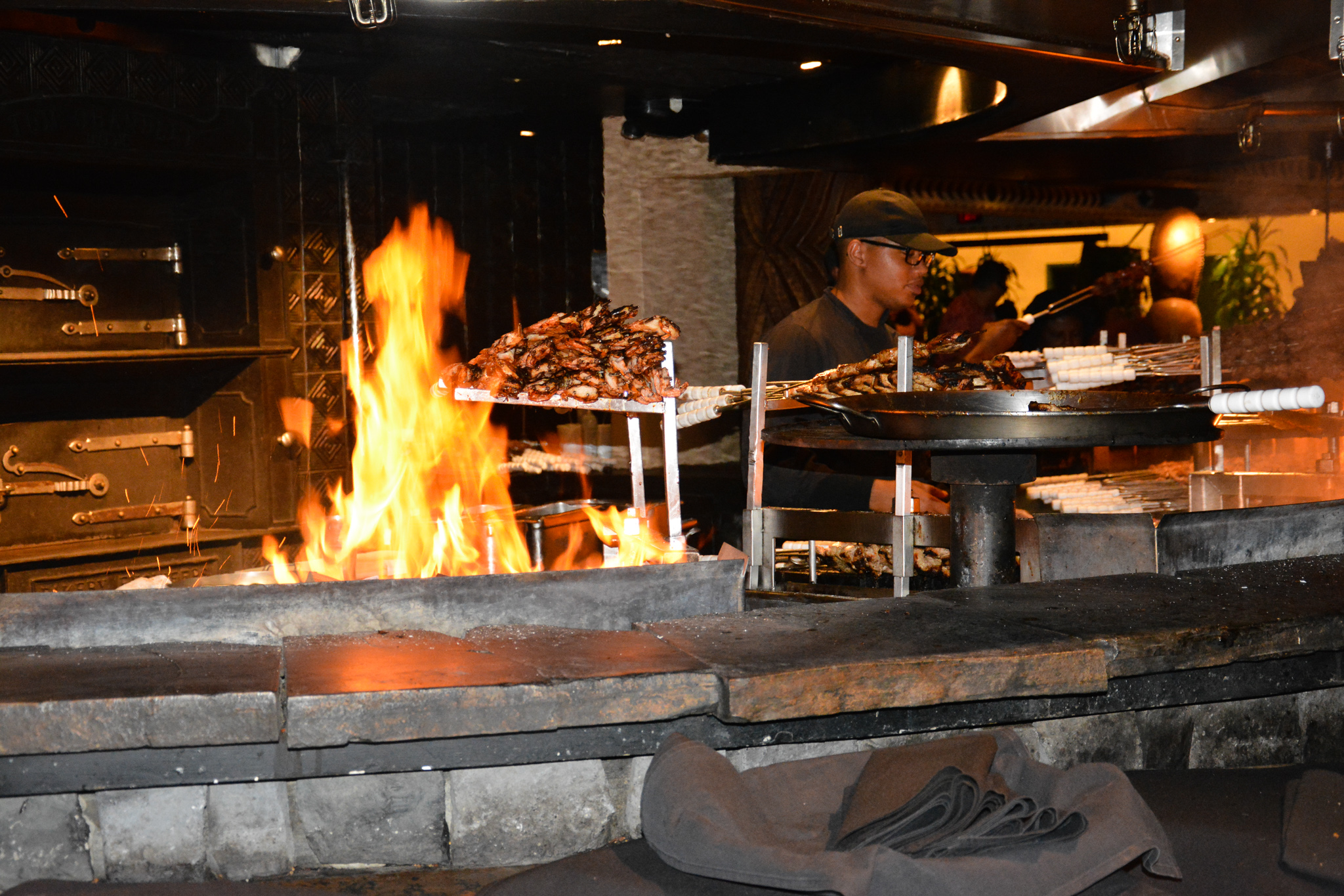Cooking over an open flame at 'Ohana