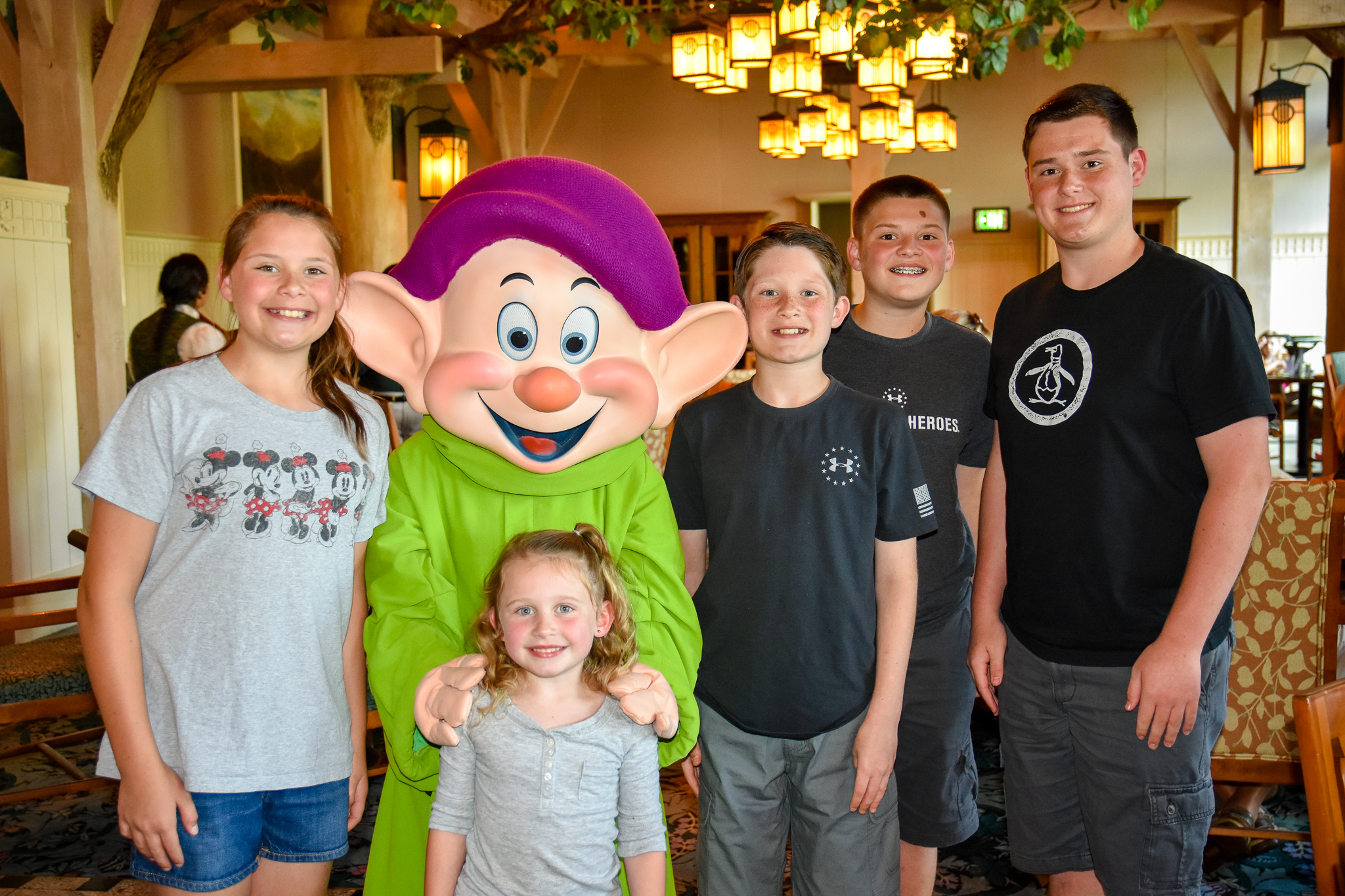 Dopey with 5 smiling kids Storybook Dining Review