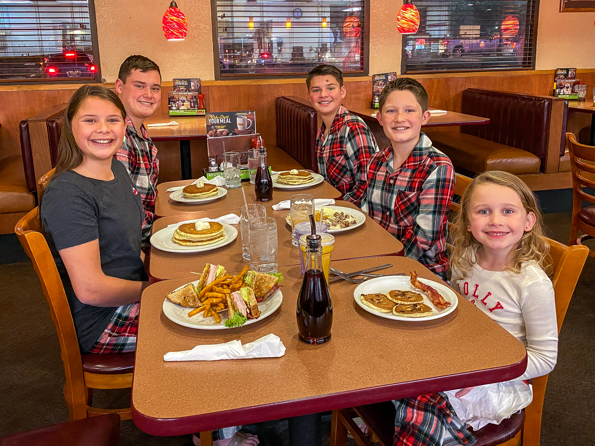 kids at Denny's for Santa Clause Christmas movie and dinner marathon