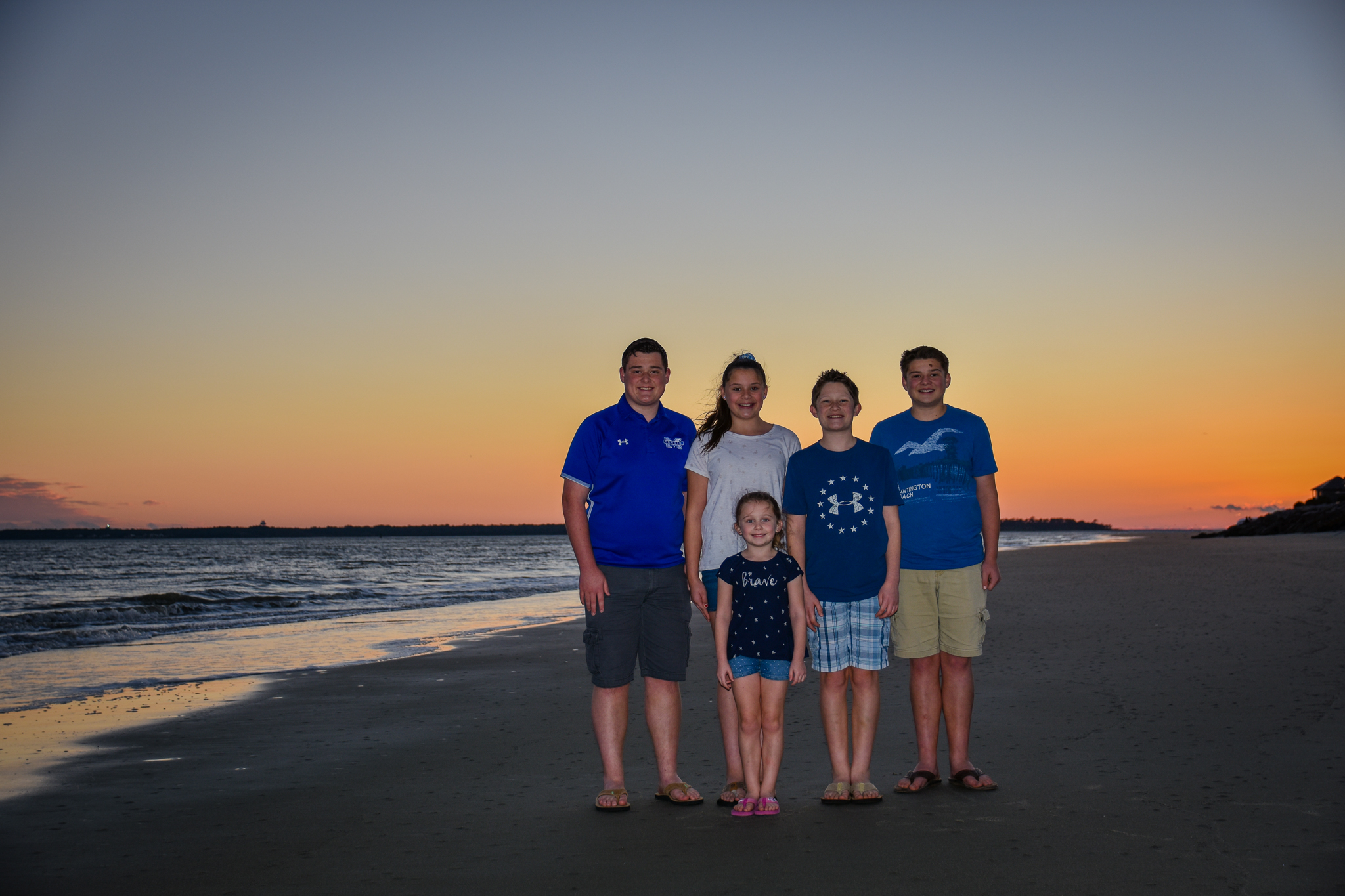 Five smiling kids at sunset St Simons Island