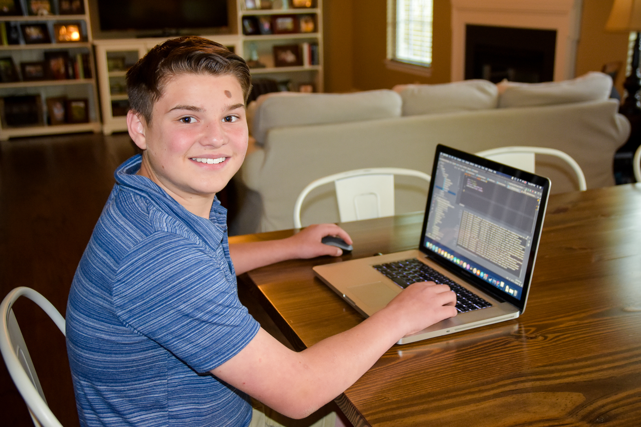 Teen working on Minecraft mods during iD Tech Virtual Camp
