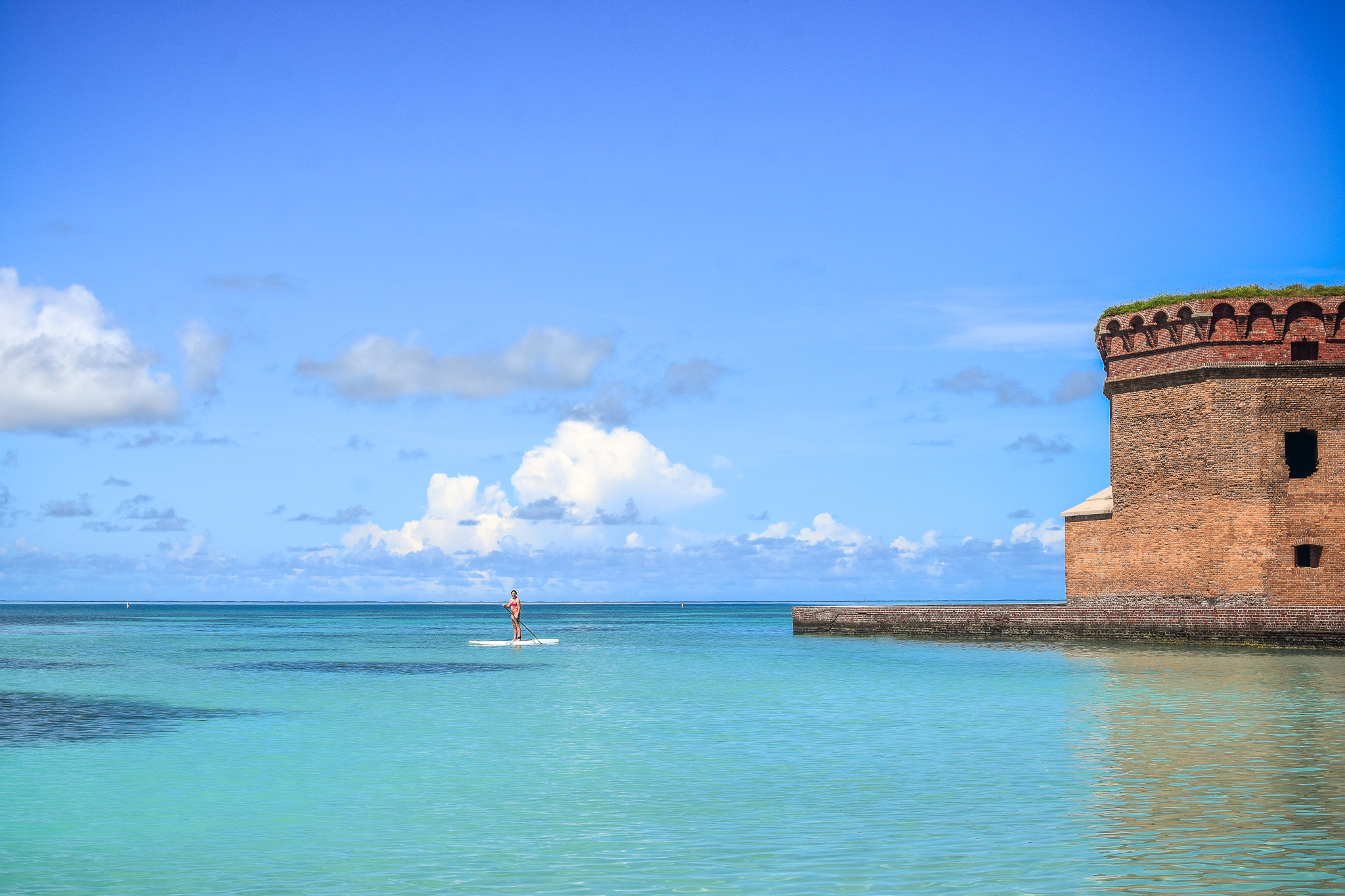 Teen paddleboarding in gorgeous water at Dry Tortugas
