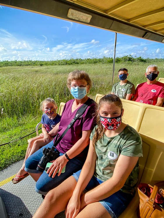 Masked and smiling faces on the Shark Valley Tram Tour